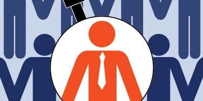 Graphic of rows of people icons with one person in a stand out colour under a magnifying glass